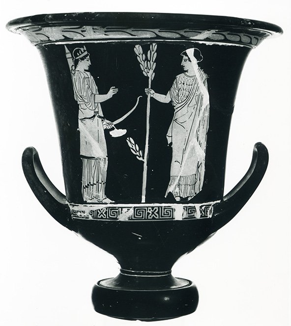 A black and white photograph of a Greek vase