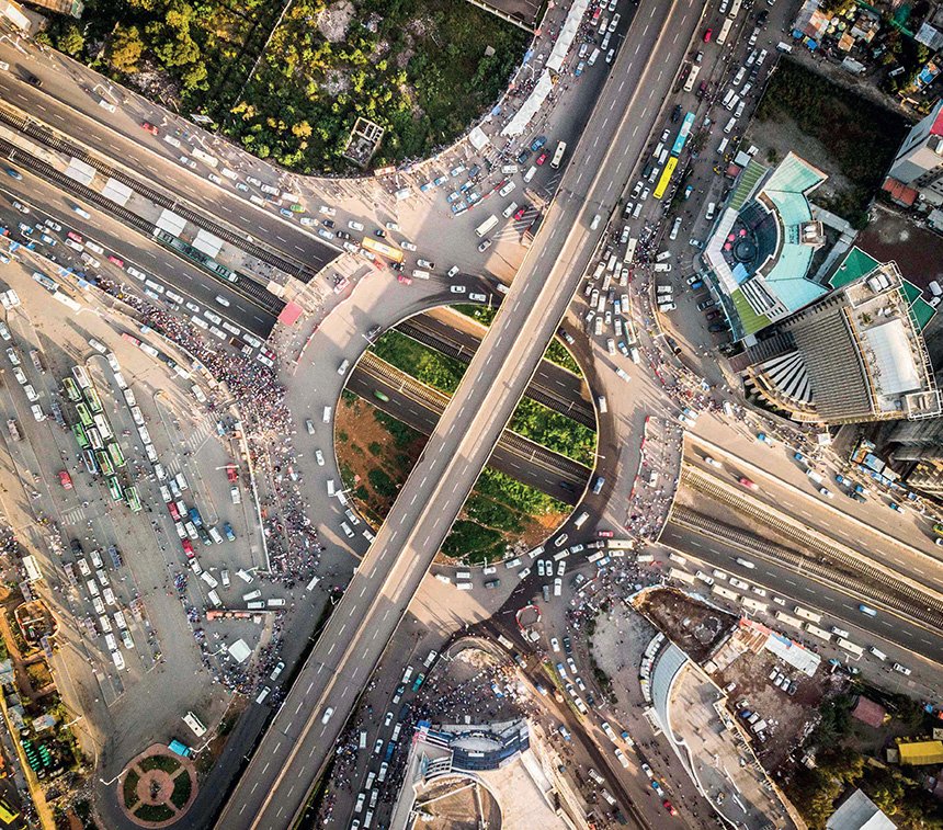 Aerial view of a busy highway intersection in an urban area