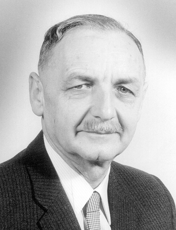 Black and white portrait picture of Geoffrey Dickens