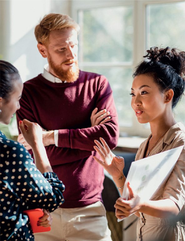 A group of researchers in conversation