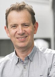A portrait picture of Professor Adam Crawford FBA