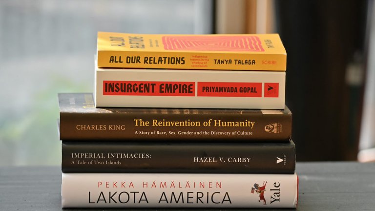 Pile of shortlisted books for the Nayef Al-Rodhan Prize 2020