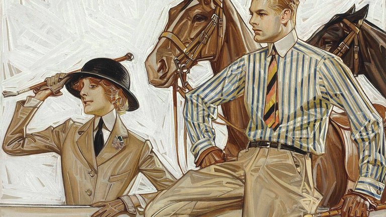 A man sitting on a fence next to a horse and a woman