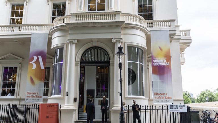 The exterior of the British Academy building with the Summer Showcase 2024 banners on display