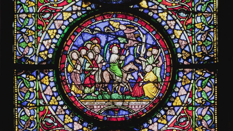 Colourful stained glass window in Canterbury Cathedral
