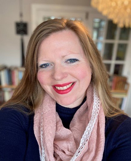 A headshot of Emma Cayley