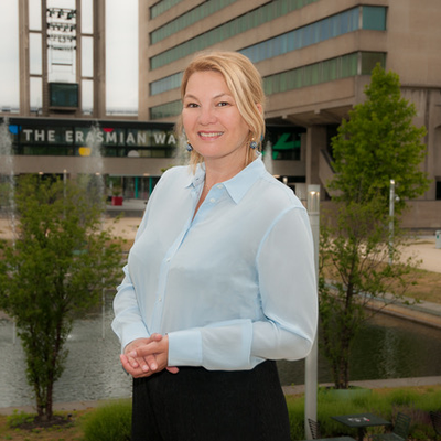 Eveline Crone standing in front of Erasmus University, Rotterdam