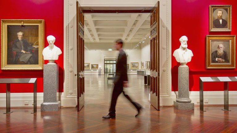 Security guard walking in art museum