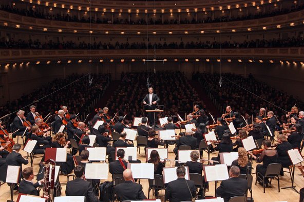 Composer (Riccrado Muti) leading the Chicago Symphony Orchestra