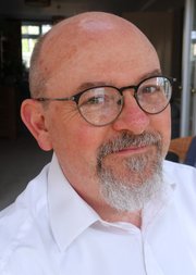 A portrait picture of Professor John Arnold FBA
