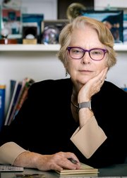 Image of Lynn Hunt looking at the camera while sitting at her desk