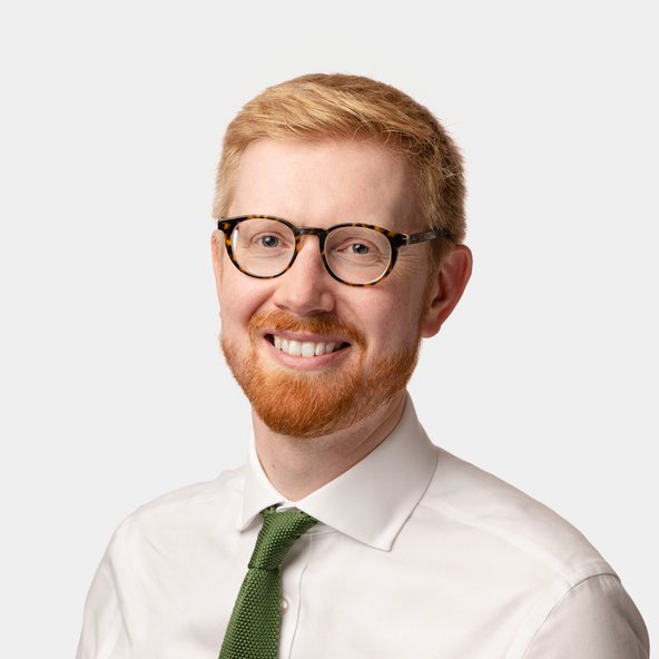 A headshot of Martin Smith