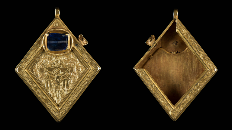 A late 15th-century gold pendant, set with a large blue sapphire