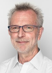 Headshot of Michael Watts FBA