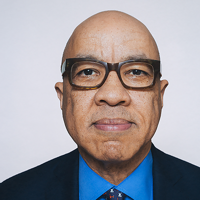 Head-and-shoulders portrait of Mr Darren Walker Hon FBA