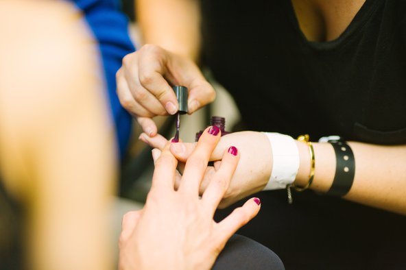 Nail-technician-paints-nails.jpg