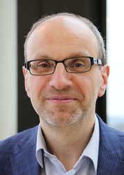 A portrait picture of Professor Stefan Dercon FBA
