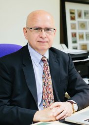 A portrait picture of Professor Timothy Michael Devinney FBA