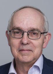 Photo of David Gellner FBA against a grey background. Photo by John Cairns