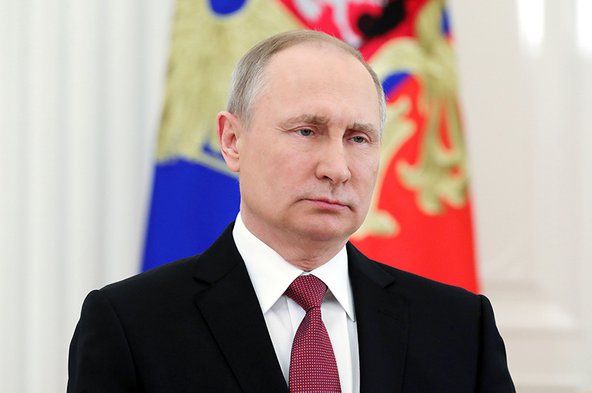 Russian President Vladimir Putin delivers a televised address to the nation in Moscow on March 23, 2018