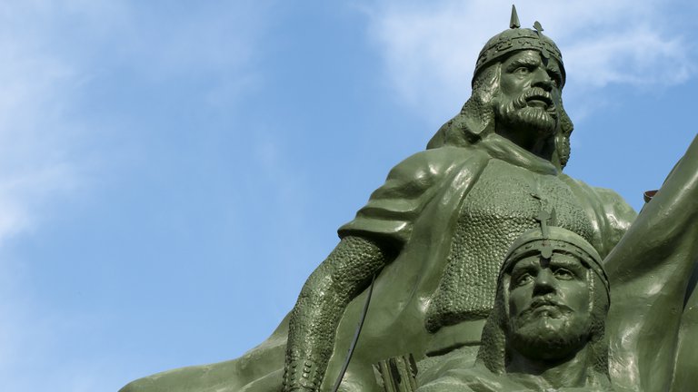 Statue of Saladin outside the old city in Damascus, Syria, against the blue sky.