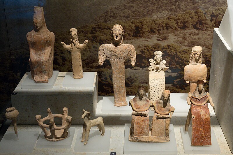 Small terracotta figurines on display at the Archaeological Museum of Ancient Corinth. The figurines are votive offerings from the sanctuary of ancient Solygeia, 6th century BC.