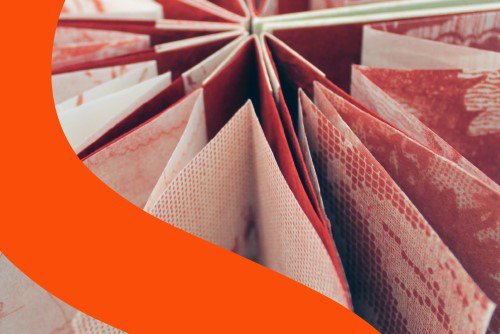 Summer Showcase 2019 branding over an open artist's book