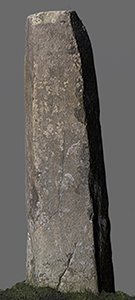 Photograph of a tall stone sticking out of the ground.
