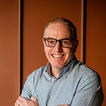 Headshot of Tom Stoneham