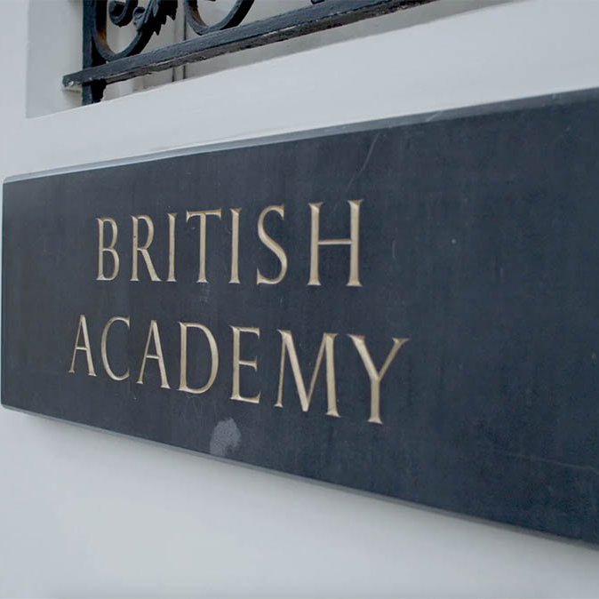Still of the British Academy sign on the building