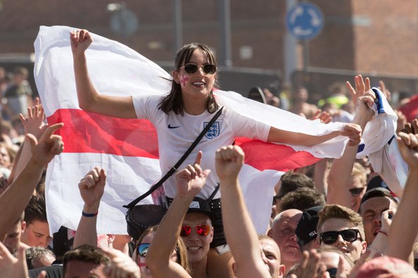   Football fans in Bristol watch England take on Sweden in the World Cup Quarter Finals on 7th July. Image credit: Matt Cardy / Getty Images.
