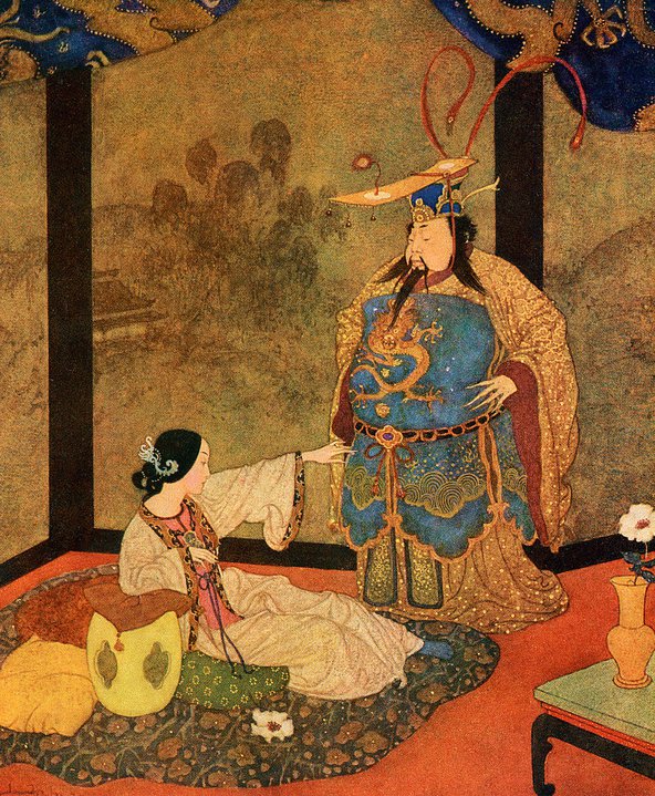 An illustration of the Chinese princess Lady Badoura wearing a pink silk robe, sitting amongst traditionally patterned cushions and blankets in her pavilion, stretching out her arm to reject the marriage advances of a suitor. The suitor is wearing a vibrant blue robe decorated with a golden dragon and a traditional ornate headpiece.