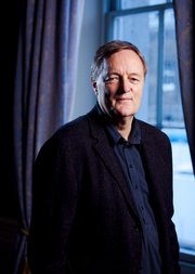 Portrait of Patrick Wright standing in front of window
